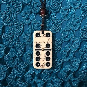 Domino necklace on black silk cord